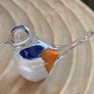 Glass bird paperweight with orange blue and white